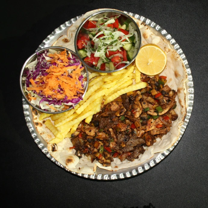 a plate of food with a variety of different foods on it
